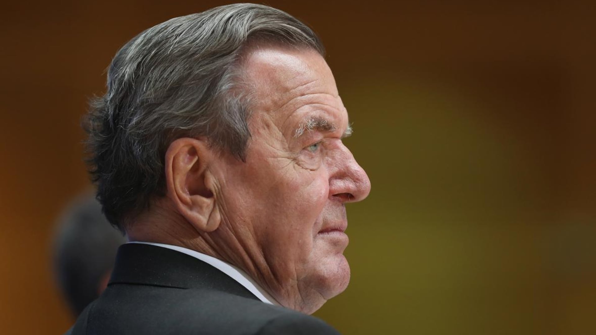 Why did former German Chancellor Schroeder arrive in Moscow?