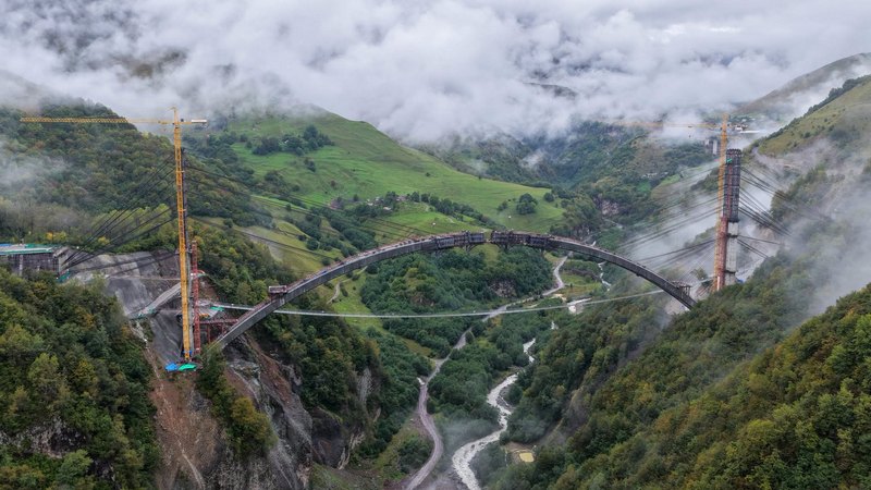 An arched bridge on the road to Lars is already under construction.