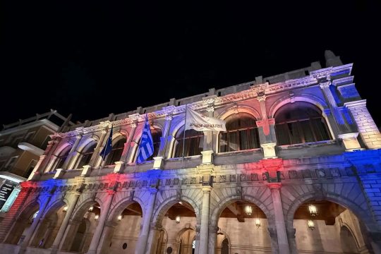 Heraklion City Hall illuminated in the colors of the Armenian flag