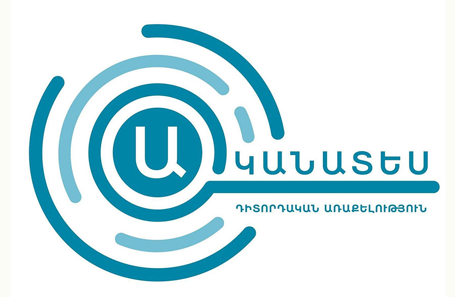 After placing the ballot in the envelope, parts of the last two lines of the ballot remain partially visible through the cut corner of the envelope: "Eyewitness"