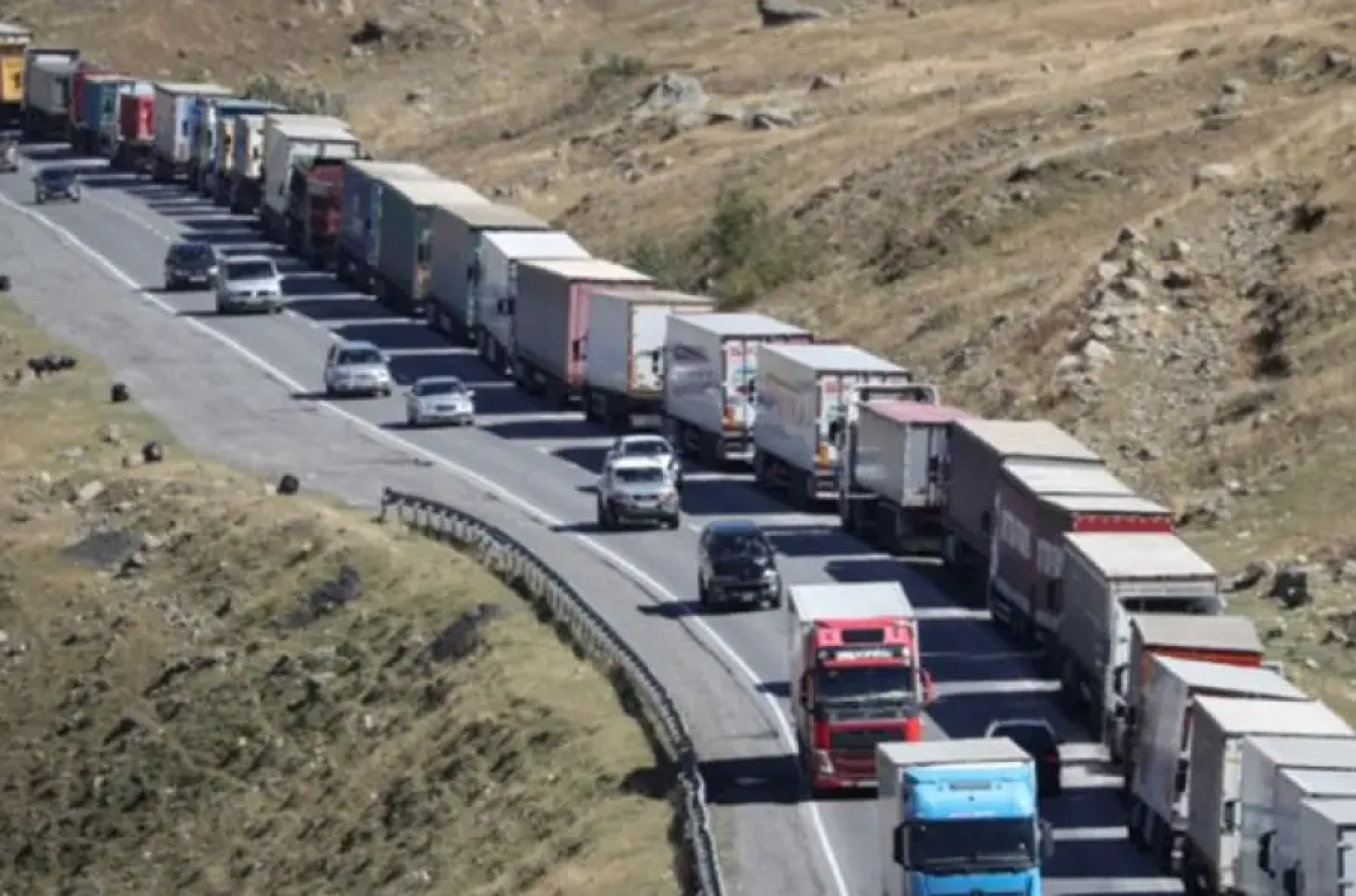 Armenian drivers have been stuck at the Upper Lars border crossing with trucks loaded with brandy for over a month.